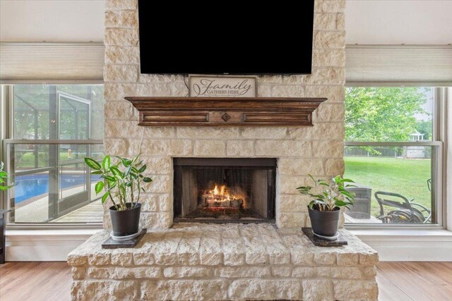 119 Tallwood Cir, Salado, TX 76571 - detailed view of a stone fireplace and wood finished floors