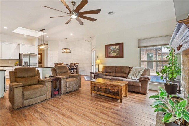119 Tallwood Cir, Salado, TX 76571 - living area with a ceiling fan, light wood-style flooring, a chandelier, and recessed lighting