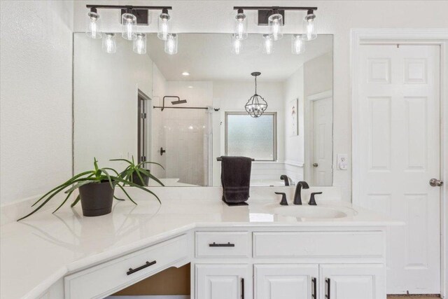 119 Tallwood Cir, Salado, TX 76571 - bathroom featuring a shower stall and double vanity