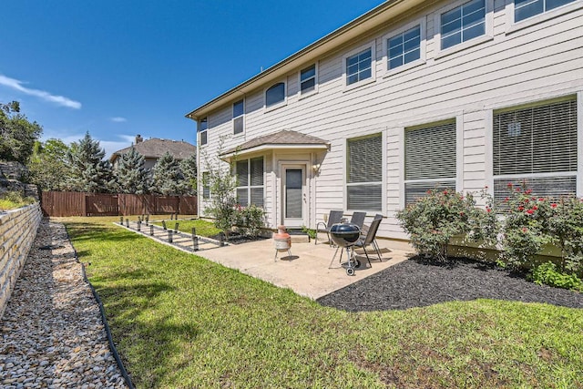 7701 Crackling Creek Dr, Austin, TX 78736 - back of property with a patio
