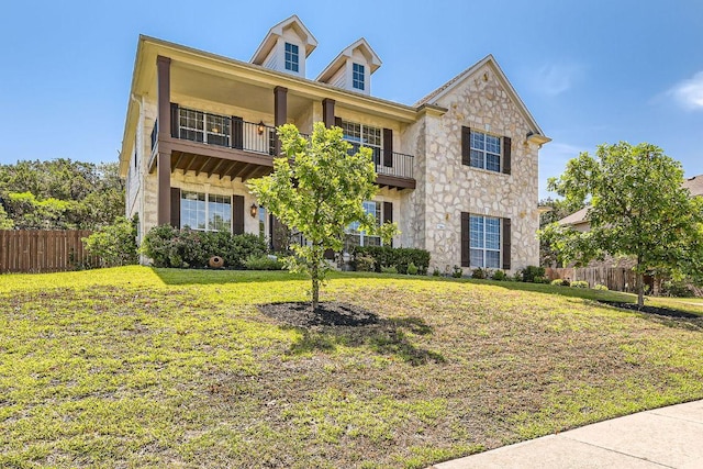 7701 Crackling Creek Dr, Austin, TX 78736 - traditional-style home featuring a balcony, stone siding, and stucco siding