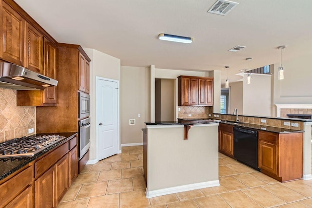 7701 Crackling Creek Dr, Austin, TX 78736 - kitchen with appliances with stainless steel finishes, under cabinet range hood, decorative backsplash, and light tile patterned floors
