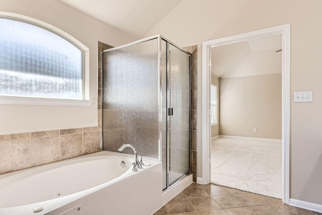 7701 Crackling Creek Dr, Austin, TX 78736 - bathroom featuring a bath, a stall shower, tile patterned floors, and lofted ceiling