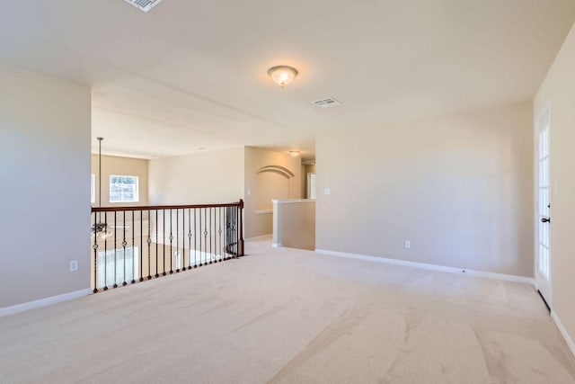 7701 Crackling Creek Dr, Austin, TX 78736 - carpeted empty room with baseboards