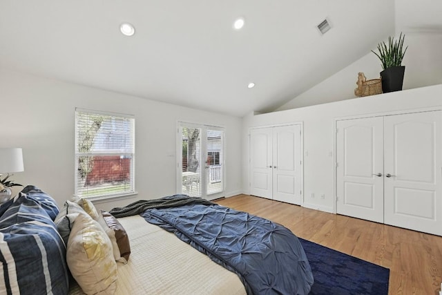 905 Juanita St, Austin, TX 78704 - bedroom with multiple closets, light wood finished floors, recessed lighting, high vaulted ceiling, and access to exterior