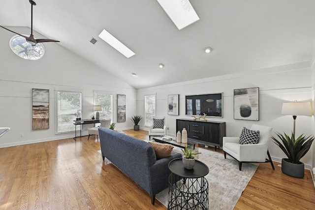 905 Juanita St, Austin, TX 78704 - living room with a skylight, high vaulted ceiling, light wood-style floors, and a ceiling fan