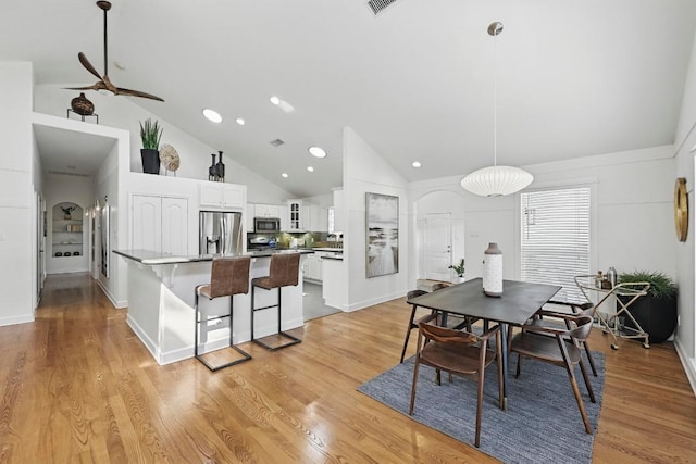 905 Juanita St, Austin, TX 78704 - dining area featuring high vaulted ceiling, ceiling fan, light wood finished floors, recessed lighting, and baseboards