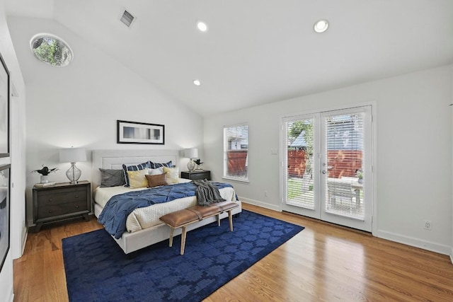 905 Juanita St, Austin, TX 78704 - bedroom featuring access to outside, lofted ceiling, wood finished floors, recessed lighting, and baseboards