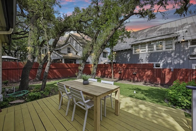 905 Juanita St, Austin, TX 78704 - deck at dusk featuring outdoor dining space