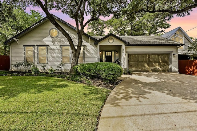 905 Juanita St, Austin, TX 78704 - ranch-style home with a garage and concrete driveway