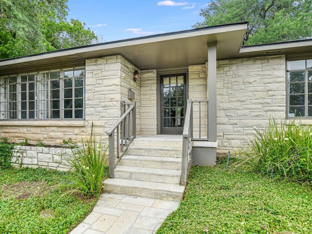3304 Windsor Rd, Austin, TX 78703 - view of exterior entry featuring stone siding