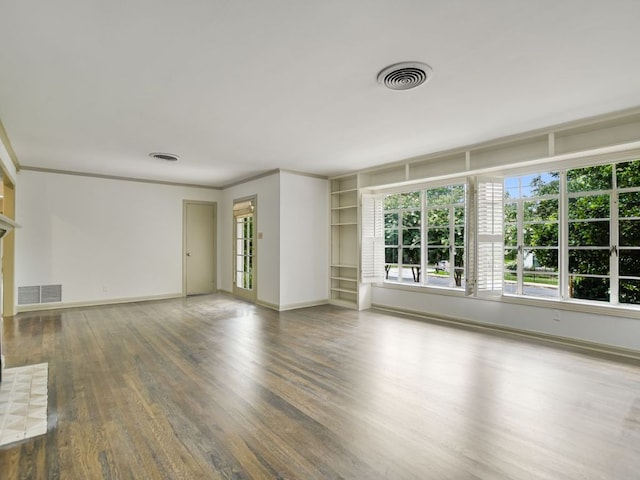 3304 Windsor Rd, Austin, TX 78703 - unfurnished living room featuring wood finished floors and ornamental molding