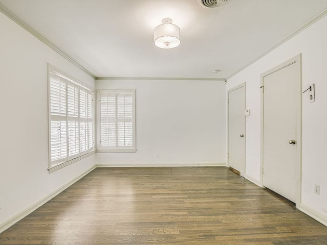 3304 Windsor Rd, Austin, TX 78703 - empty room featuring crown molding and wood finished floors