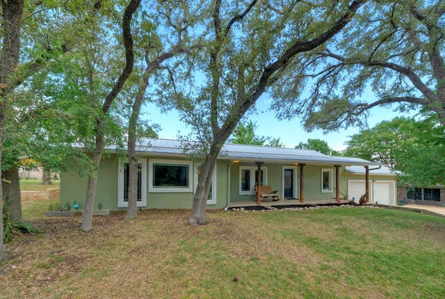 5606 Longhorn Lndg, Austin, TX 78734 - ranch-style house featuring an attached garage, a porch, driveway, stucco siding, and a front yard