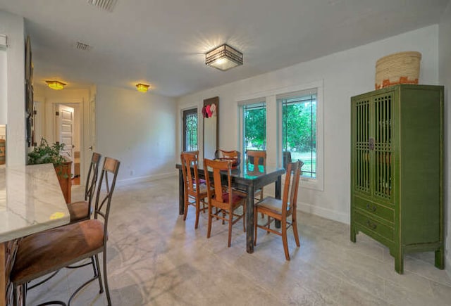 5606 Longhorn Lndg, Austin, TX 78734 - dining area featuring baseboards