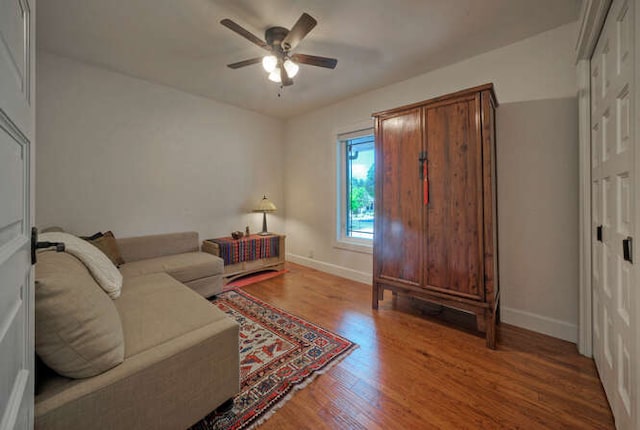 5606 Longhorn Lndg, Austin, TX 78734 - living area with a ceiling fan, baseboards, and wood finished floors