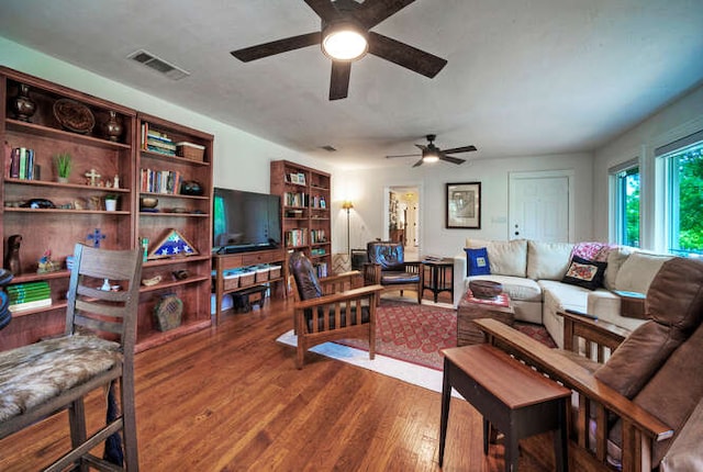 5606 Longhorn Lndg, Austin, TX 78734 - living area with ceiling fan and wood finished floors