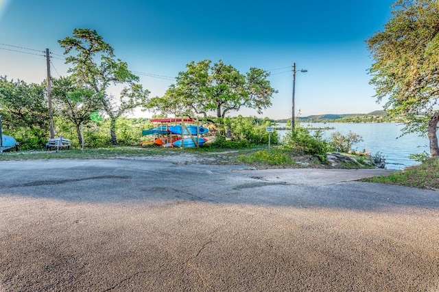 5606 Longhorn Lndg, Austin, TX 78734 - view of street with a water view