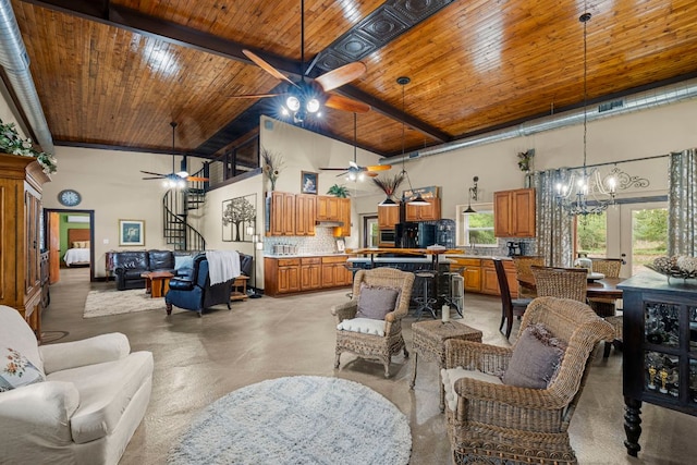 966 County Road 439th Rd, Stockdale, TX 78160 - living room with ceiling fan, high vaulted ceiling, finished concrete flooring, stairs, and wooden ceiling with exposed beams