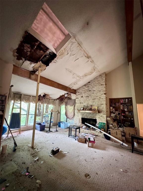 3409 Rosefinch Trl, Austin, TX 78746 - misc room with a fireplace and lofted ceiling