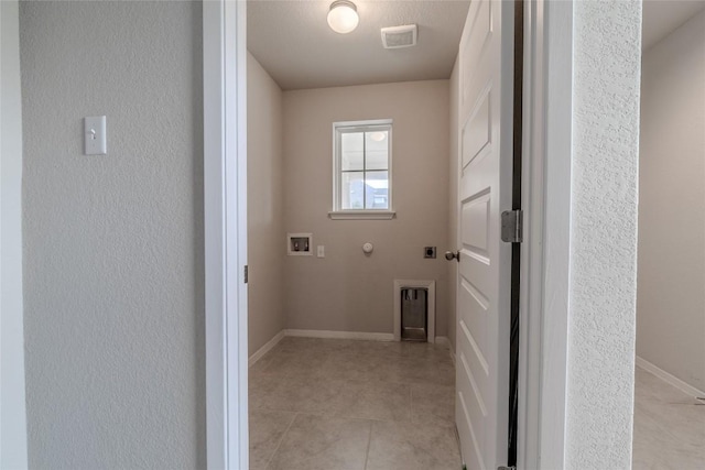 2800 Joe Dimaggio Blvd Unit 95, Round Rock, TX 78665 - laundry area featuring hookup for a washing machine, gas dryer hookup, baseboards, and hookup for an electric dryer