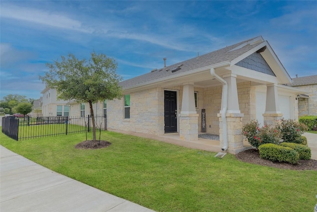 2800 Joe Dimaggio Blvd Unit 95, Round Rock, TX 78665 - view of side of property with stone siding, roof with shingles, an attached garage, and covered porch