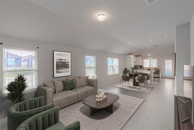2800 Joe Dimaggio Blvd Unit 95, Round Rock, TX 78665 - living area with baseboards and lofted ceiling