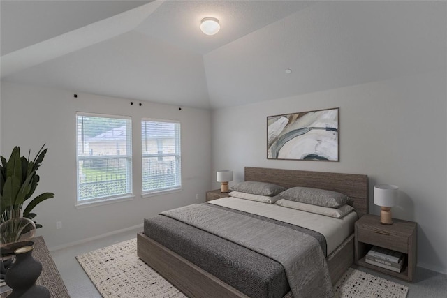 2800 Joe Dimaggio Blvd Unit 95, Round Rock, TX 78665 - carpeted bedroom featuring vaulted ceiling and baseboards