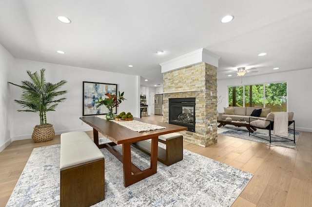 1802 Corona Dr, Austin, TX 78723 - living area with wood-type flooring, a fireplace, recessed lighting, and a ceiling fan