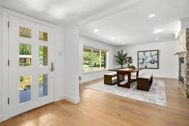 1802 Corona Dr, Austin, TX 78723 - dining area featuring a fireplace, light wood-style flooring, and recessed lighting