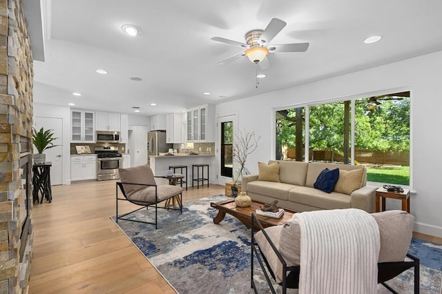 1802 Corona Dr, Austin, TX 78723 - living area featuring a ceiling fan, light wood-type flooring, and recessed lighting