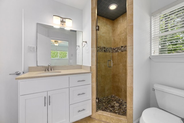 1802 Corona Dr, Austin, TX 78723 - bathroom with vanity, a shower stall, and ceiling fan