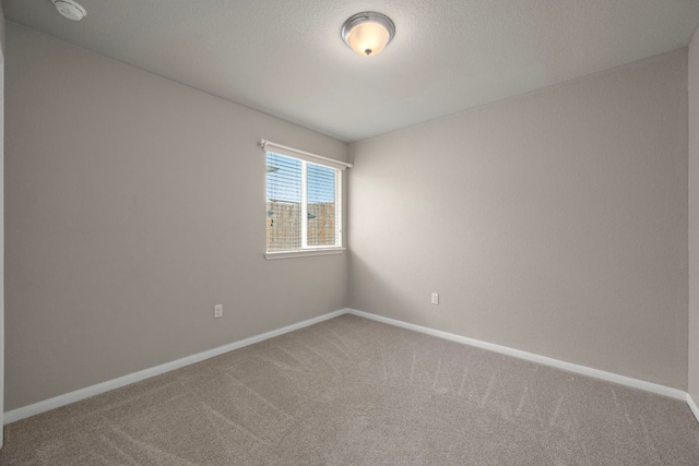 144 Sulphur River Loop, Hutto, TX 78634 - spare room with carpet, baseboards, and a smoke detector