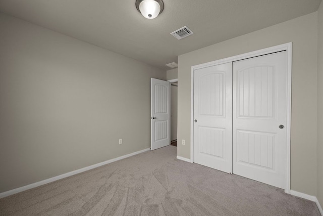 144 Sulphur River Loop, Hutto, TX 78634 - unfurnished bedroom with carpet, baseboards, and a closet