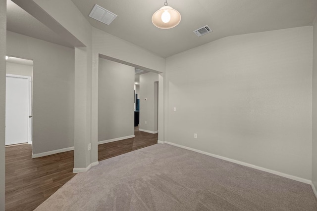 144 Sulphur River Loop, Hutto, TX 78634 - unfurnished bedroom featuring carpet, baseboards, and vaulted ceiling