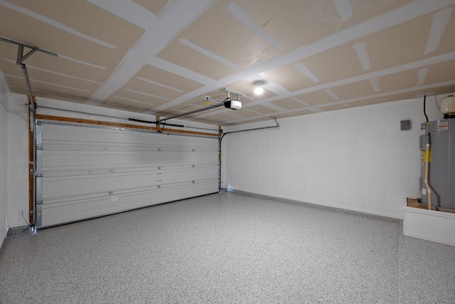 144 Sulphur River Loop, Hutto, TX 78634 - garage featuring water heater, a garage door opener, and baseboards