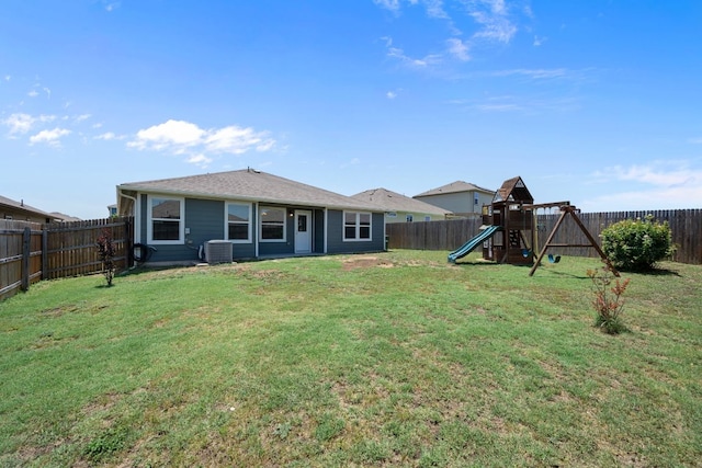 144 Sulphur River Loop, Hutto, TX 78634 - back of house with a playground and cooling unit
