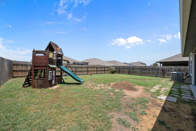 144 Sulphur River Loop, Hutto, TX 78634 - view of yard with a playground and central air condition unit