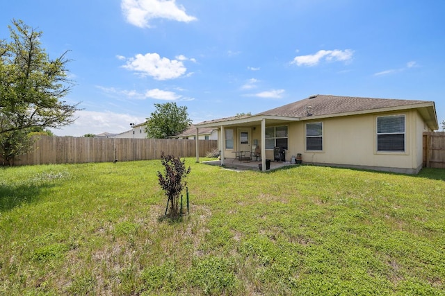120 Wegstrom St, Hutto, TX 78634 - rear view of house with a patio