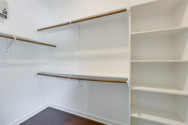 207 W Johanna St Unit 102, Austin, TX 78704 - spacious closet featuring dark wood-type flooring