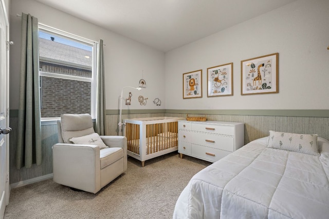 809 Cade Cv, Georgetown, TX 78626 - bedroom featuring a wainscoted wall and light carpet