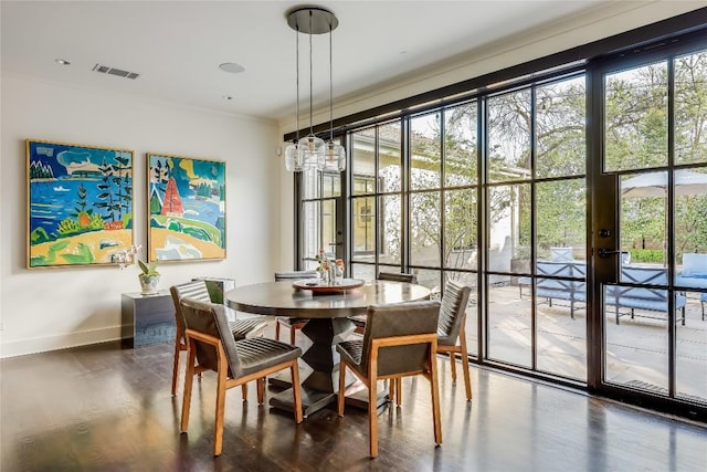 3317 Bowman Ave, Austin, TX 78703 - dining room with baseboards and wood finished floors