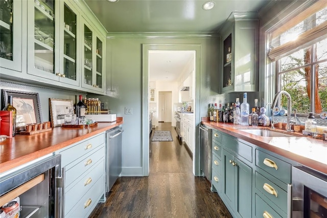 3317 Bowman Ave, Austin, TX 78703 - indoor dry bar featuring beverage cooler, dark wood-style floors, and ornamental molding