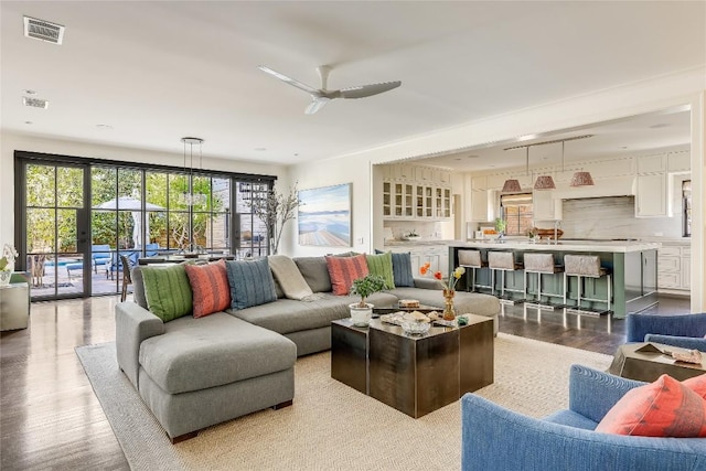 3317 Bowman Ave, Austin, TX 78703 - living area with wood finished floors and ceiling fan