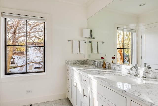 3317 Bowman Ave, Austin, TX 78703 - full bathroom with double vanity, healthy amount of natural light, baseboards, and ornamental molding
