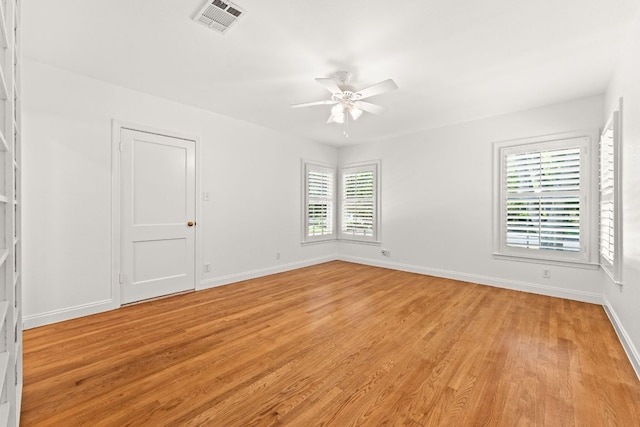 5401 Shoal Creek Blvd, Austin, TX 78756 - unfurnished room featuring a ceiling fan, light wood-style flooring, and baseboards