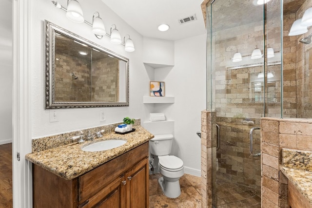 5401 Shoal Creek Blvd, Austin, TX 78756 - full bathroom with vanity, toilet, a stall shower, and baseboards