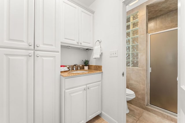 5401 Shoal Creek Blvd, Austin, TX 78756 - bathroom featuring toilet, a shower stall, vanity, and tile patterned flooring
