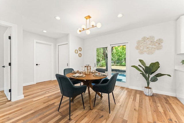 5102 Ravensdale Ln, Austin, TX 78723 - dining space with light wood finished floors, a chandelier, recessed lighting, and baseboards