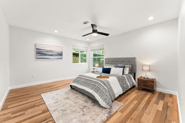 5102 Ravensdale Ln, Austin, TX 78723 - bedroom with light wood-type flooring, baseboards, ceiling fan, and recessed lighting